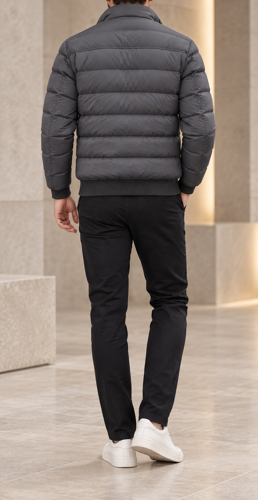 Chaqueta acolchada de hombre gris trasera