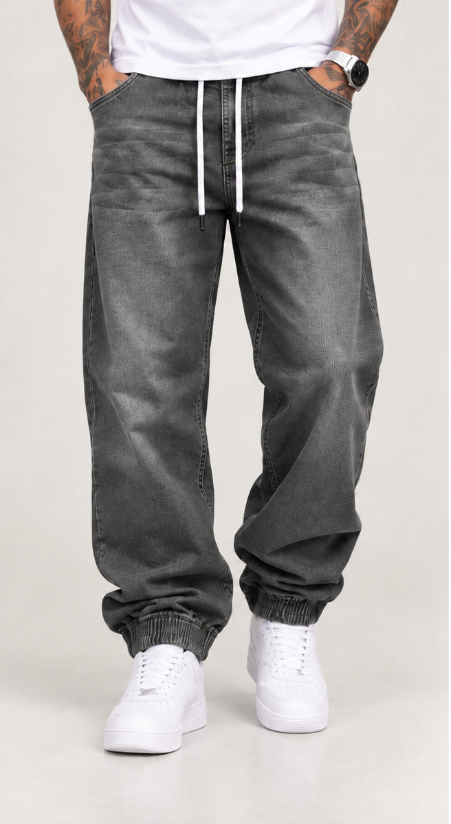 Pantalón baggy puño ancho hombre gris frontal