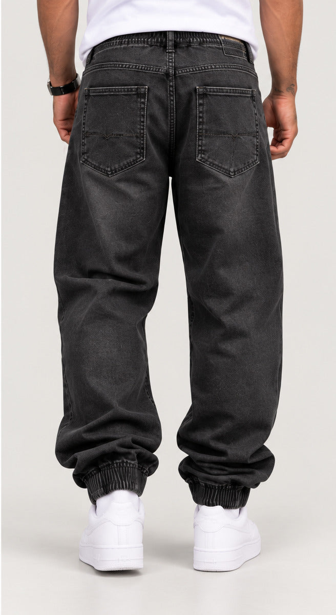 Pantalón baggy puño ancho hombre negro trasera