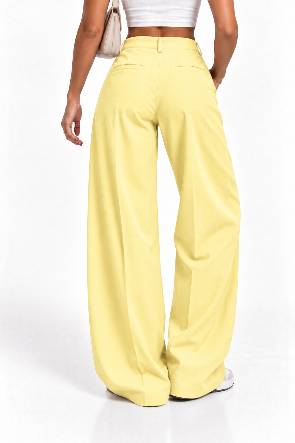 Pantalón oversize fluido amarillo pastel de mujer, vista trasera