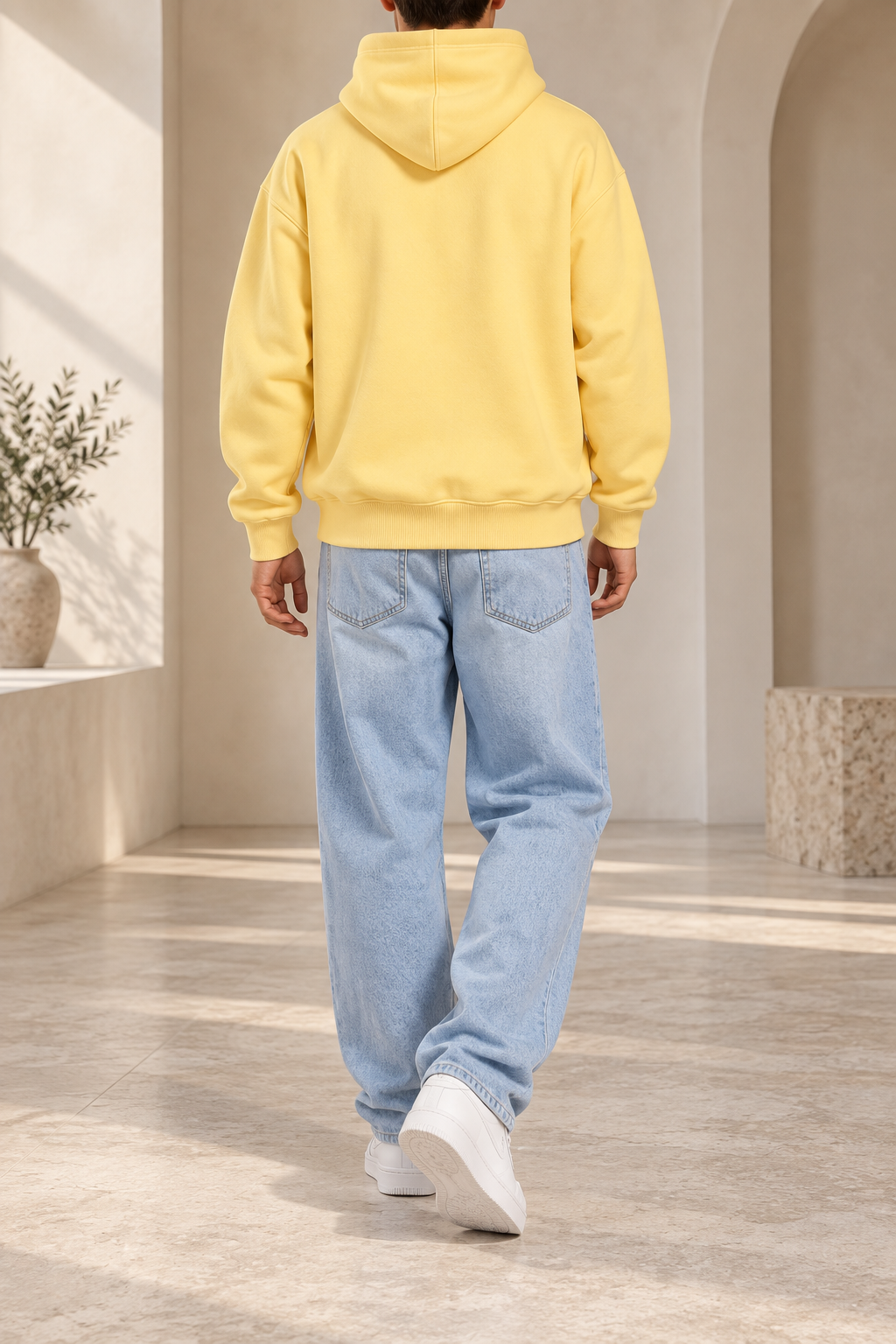 Sudadera amarillo pastel trasera